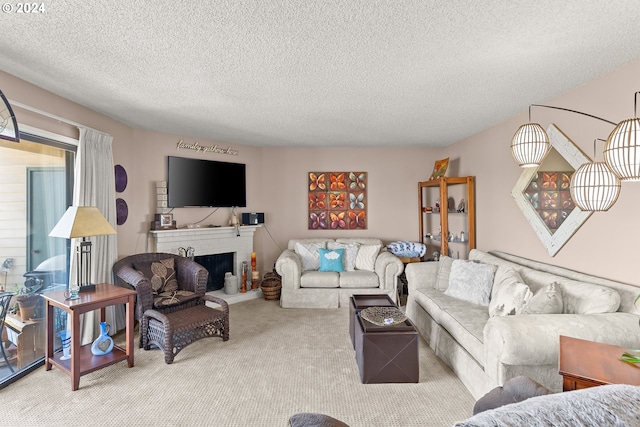 carpeted living room with a brick fireplace and a textured ceiling