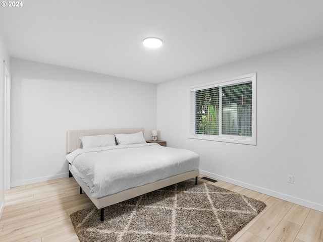 bedroom featuring light hardwood / wood-style flooring