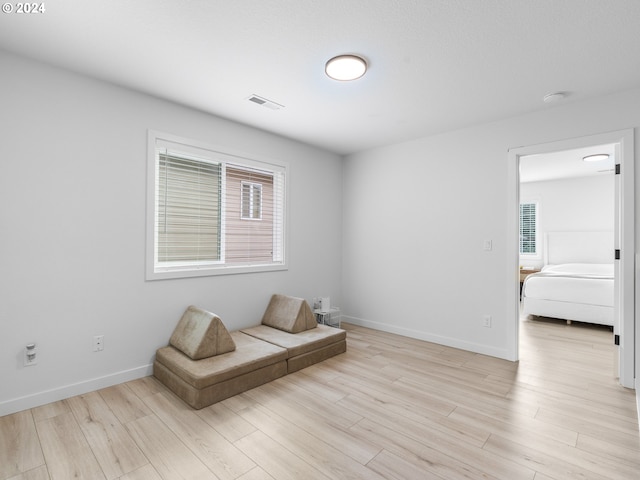 unfurnished room with light hardwood / wood-style floors