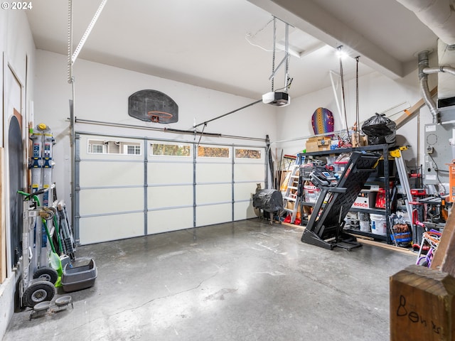 garage featuring a garage door opener