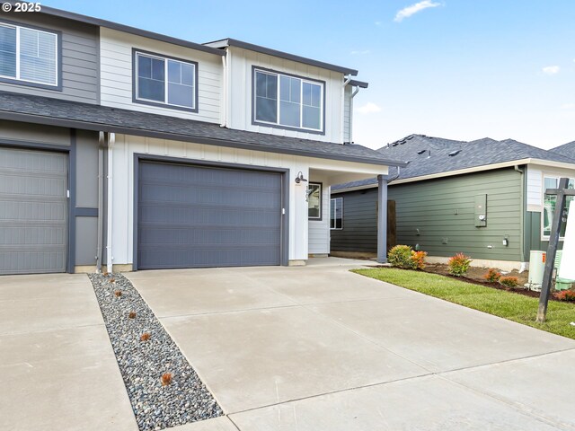 view of front of property featuring a garage