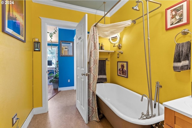 1104 SW Columbia St Unit 105, Portland, OR 97201 - full bathroom with crown molding, a freestanding bath, and vanity