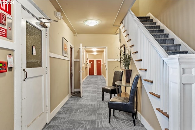 corridor featuring carpet flooring