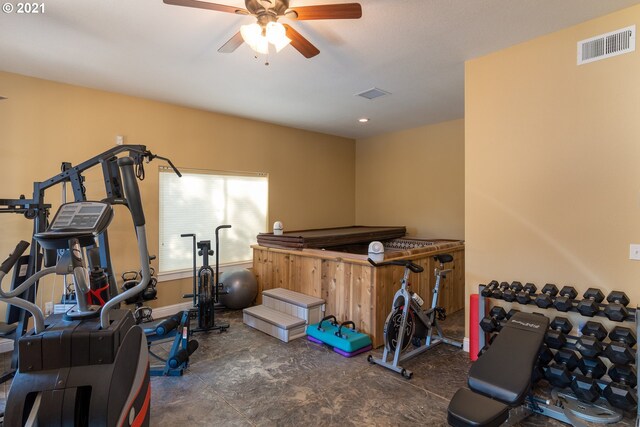 bedroom with dark tile flooring and ceiling fan