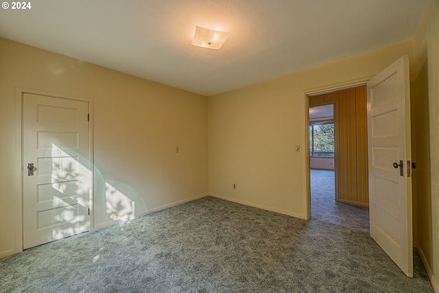 91235 N Bank Ln, Coquille, OR 97423 - carpeted empty room featuring baseboards