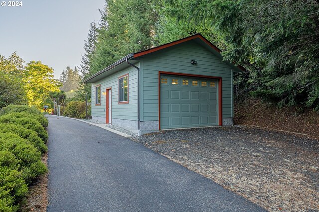 garage with wood walls