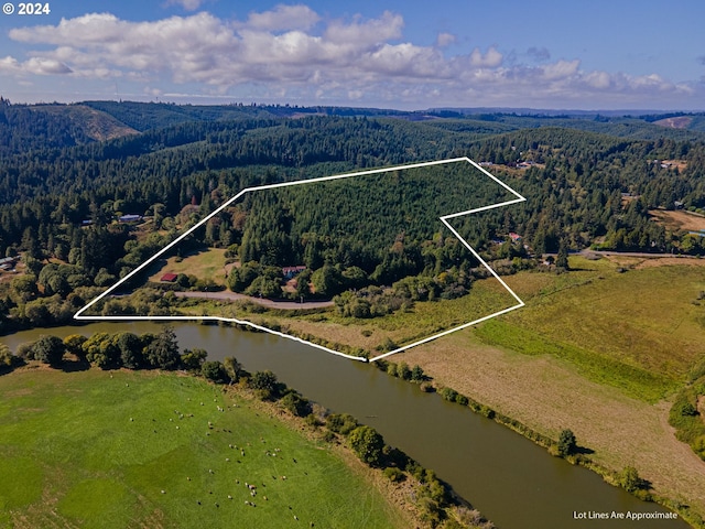 91235 N Bank Ln, Coquille, OR 97423 - aerial view featuring a wooded view and a water view