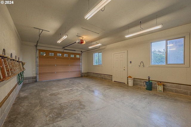 91235 N Bank Ln, Coquille, OR 97423 - garage featuring a garage door opener