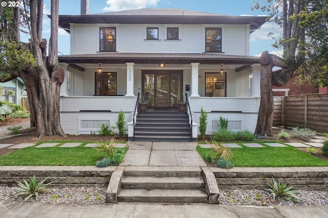 view of front of property featuring covered porch