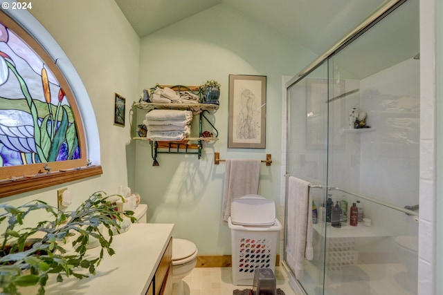 bathroom featuring vanity, toilet, an enclosed shower, and vaulted ceiling