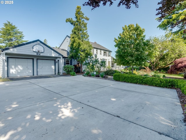 view of front of home with driveway and a garage