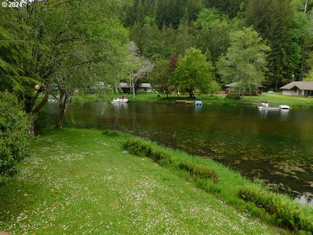 view of home's community featuring a water view