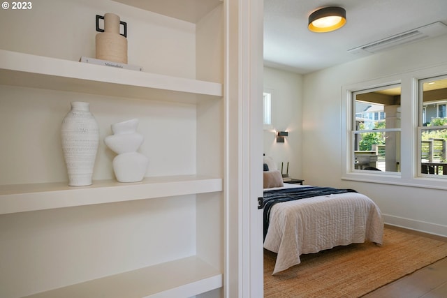 bedroom featuring hardwood / wood-style flooring