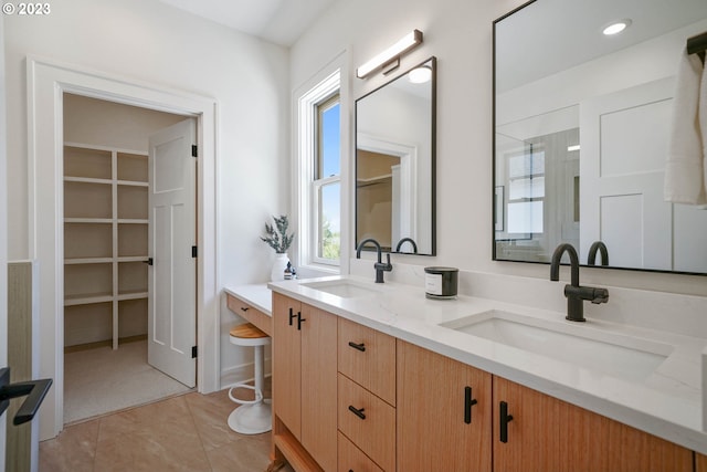 bathroom with vanity and tile patterned floors