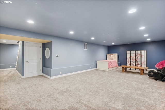 rec room with light carpet