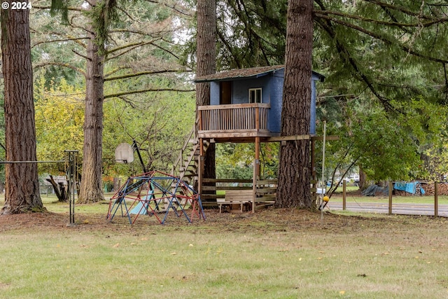 view of play area with a yard