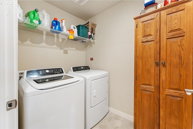 laundry room with washer and clothes dryer