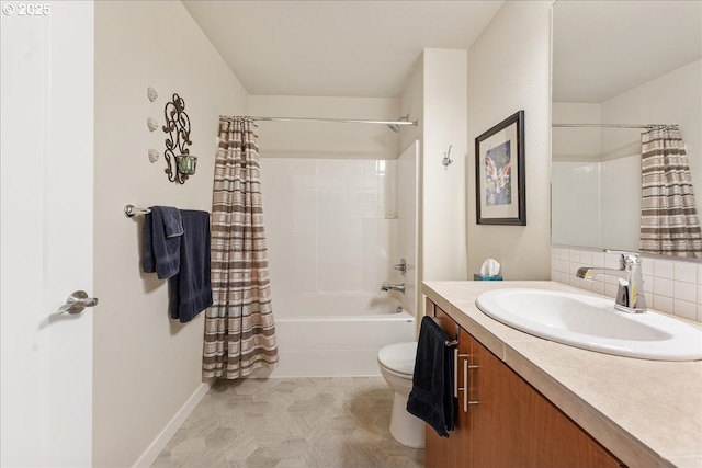 full bathroom featuring toilet, vanity, decorative backsplash, and shower / bath combo with shower curtain