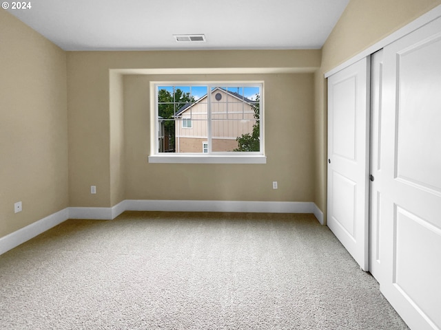 unfurnished bedroom with carpet