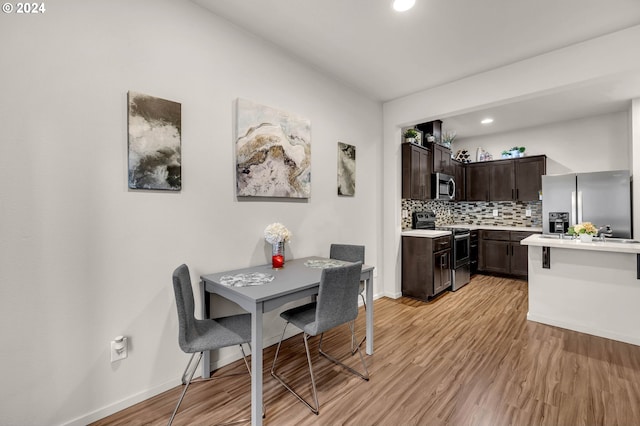 dining room featuring light wood-type flooring