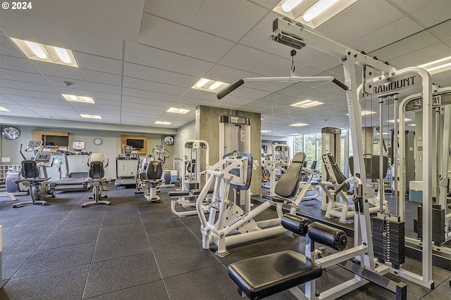 gym featuring a drop ceiling