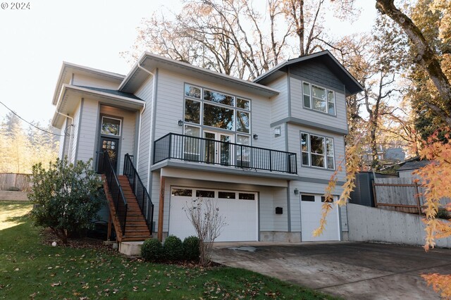 back of house with a garage