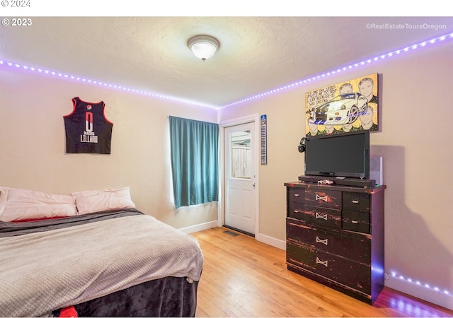 bedroom featuring hardwood / wood-style floors