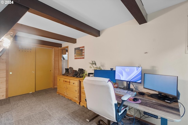 home office with carpet flooring and beam ceiling