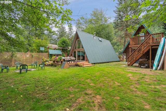 view of yard with a wooden deck