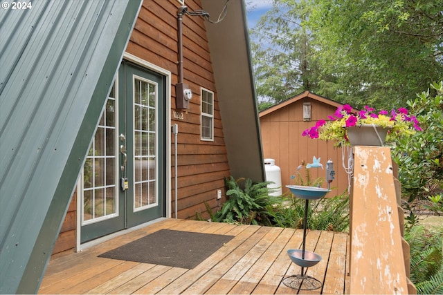 wooden terrace featuring french doors