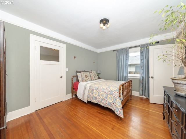 bedroom featuring hardwood / wood-style flooring