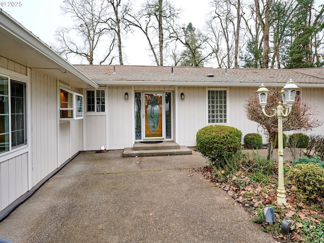 property entrance with a patio