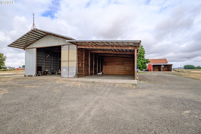 garage featuring a carport