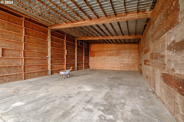 miscellaneous room featuring unfinished concrete flooring