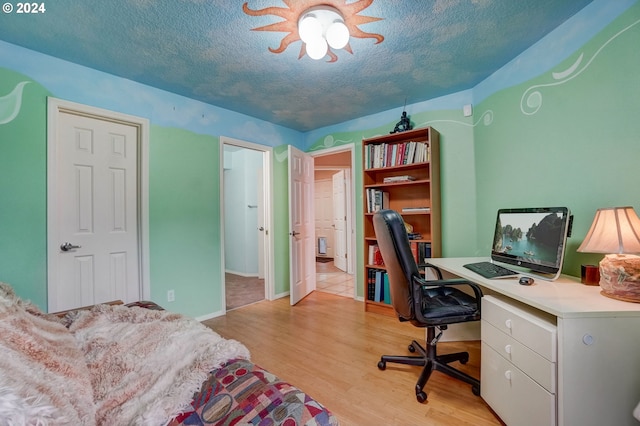 bathroom featuring vanity, a textured ceiling, and tile patterned flooring