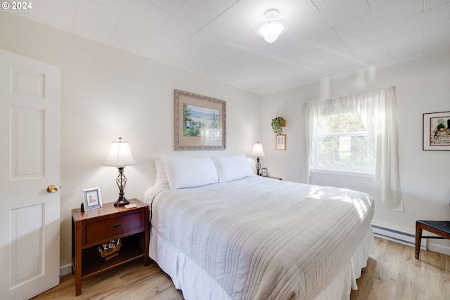 bedroom featuring light hardwood / wood-style floors