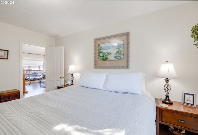 bedroom featuring hardwood / wood-style floors