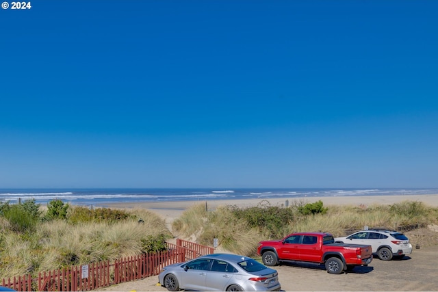 water view featuring a beach view