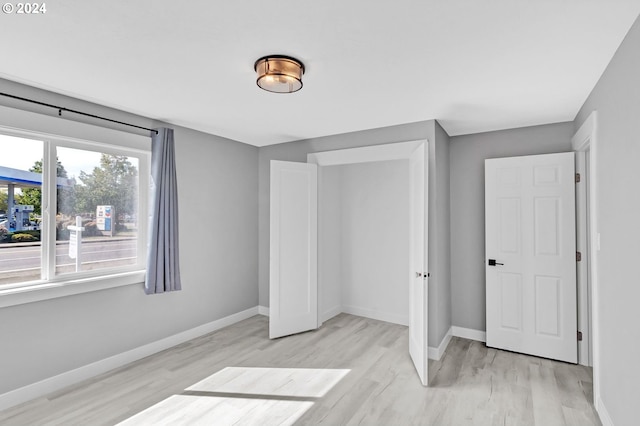 bedroom featuring light hardwood / wood-style flooring