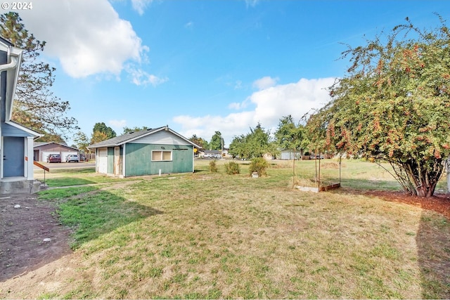 view of yard with a garage