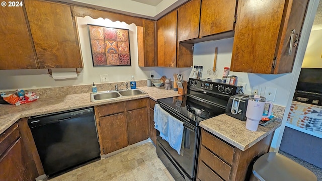 kitchen featuring sink and black appliances