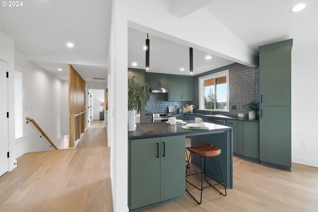 kitchen featuring a kitchen breakfast bar, lofted ceiling with beams, tasteful backsplash, wall oven, and light hardwood / wood-style floors