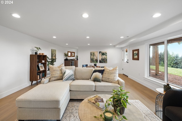 living room with light hardwood / wood-style floors