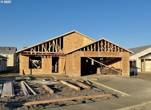 property under construction featuring an outdoor structure