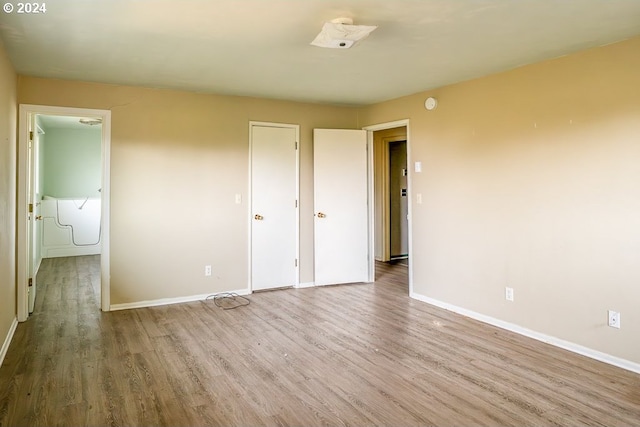 unfurnished bedroom featuring light hardwood / wood-style flooring