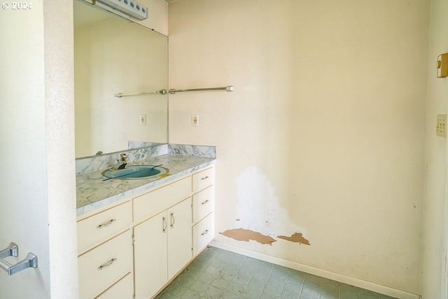 bathroom with vanity and a wall unit AC