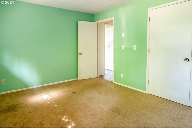 view of carpeted spare room