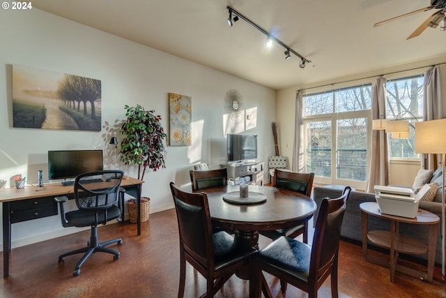 dining room featuring ceiling fan