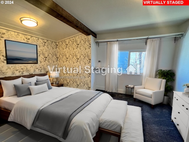 bedroom featuring beam ceiling