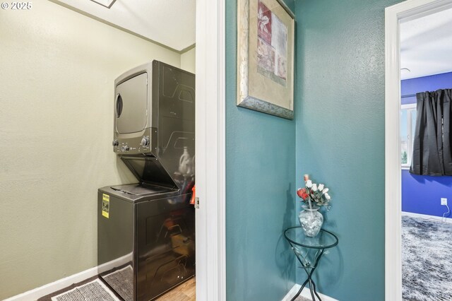 1763 NE 19th St, Gresham, OR 97030 - washroom featuring stacked washer / drying machine and a textured wall